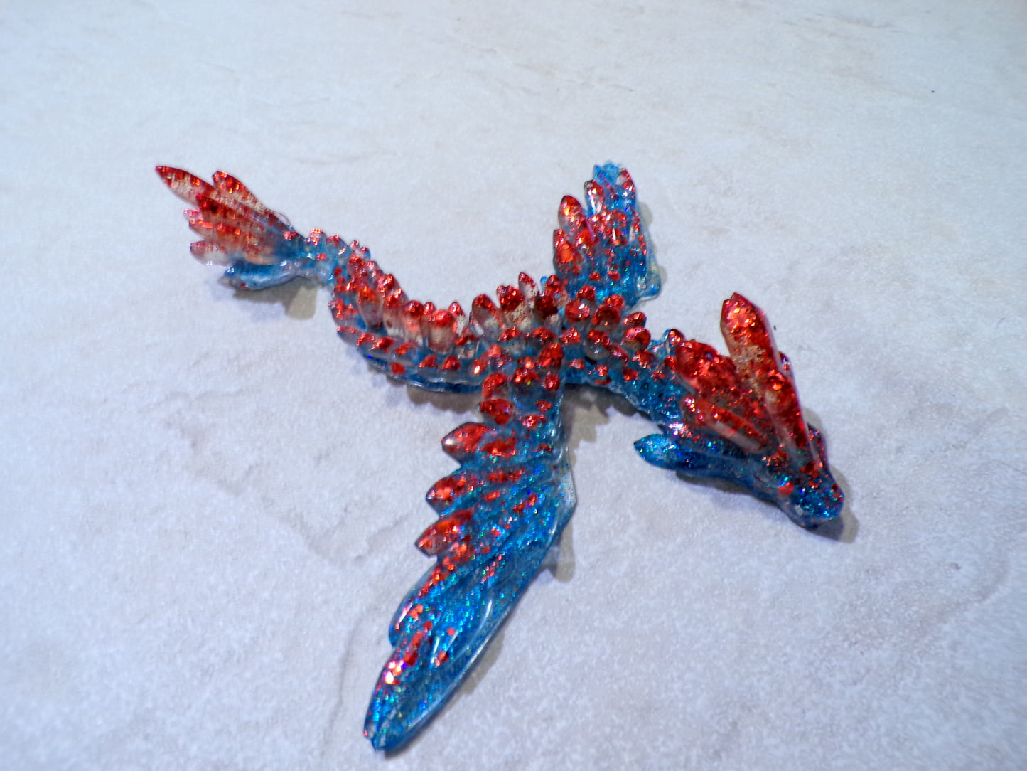 FLYING DRAGON W/ EYELETS TO HANG BLUE & RED GLITTER